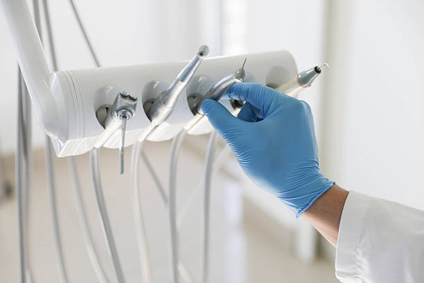 Professional Tooth Extraction technician working in South Duxbury, MA